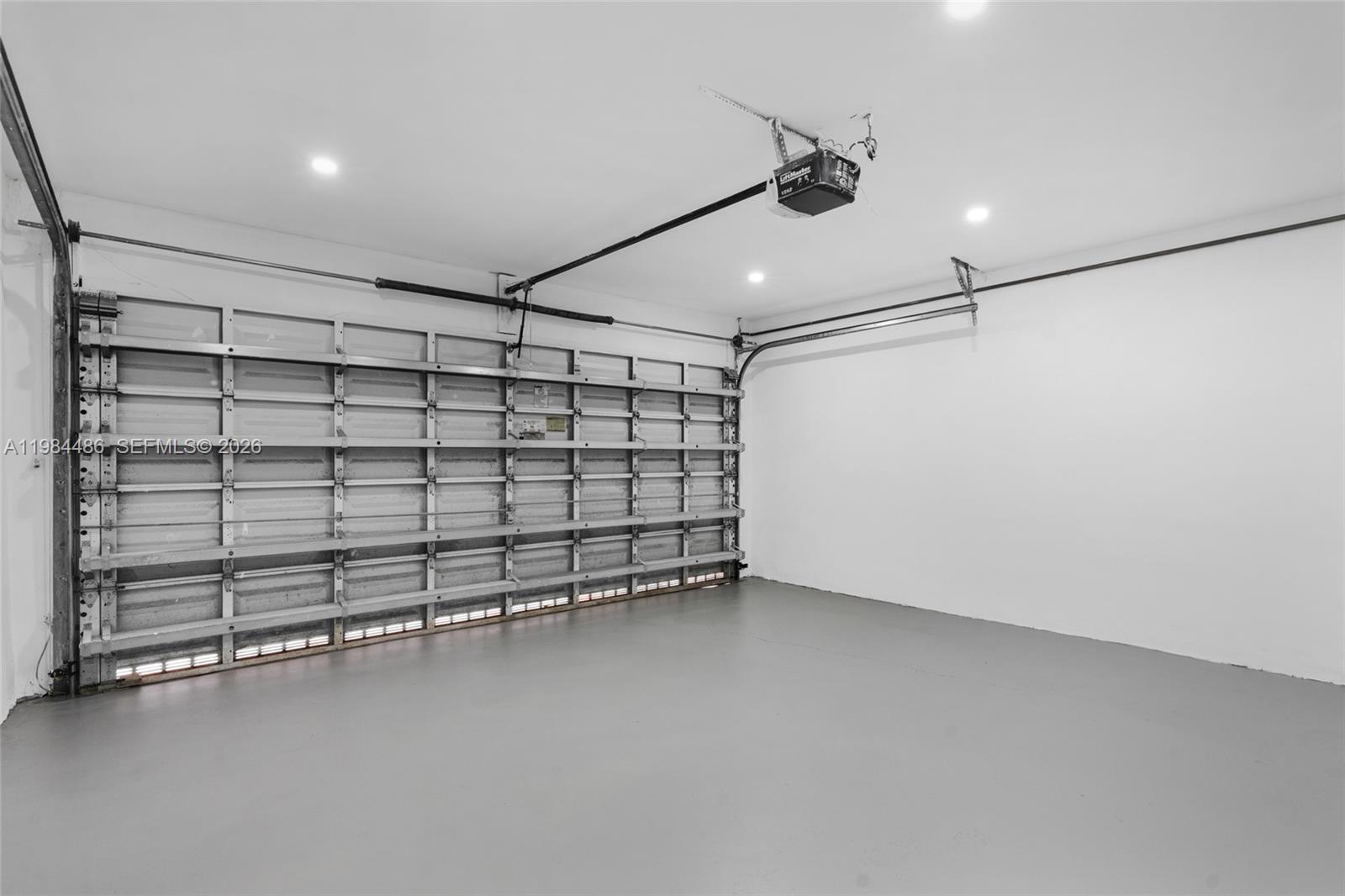 15174 Southwest 111th Street Miami, FL 33196 - Photo 34 of 49 a view of a room with racks on the wall