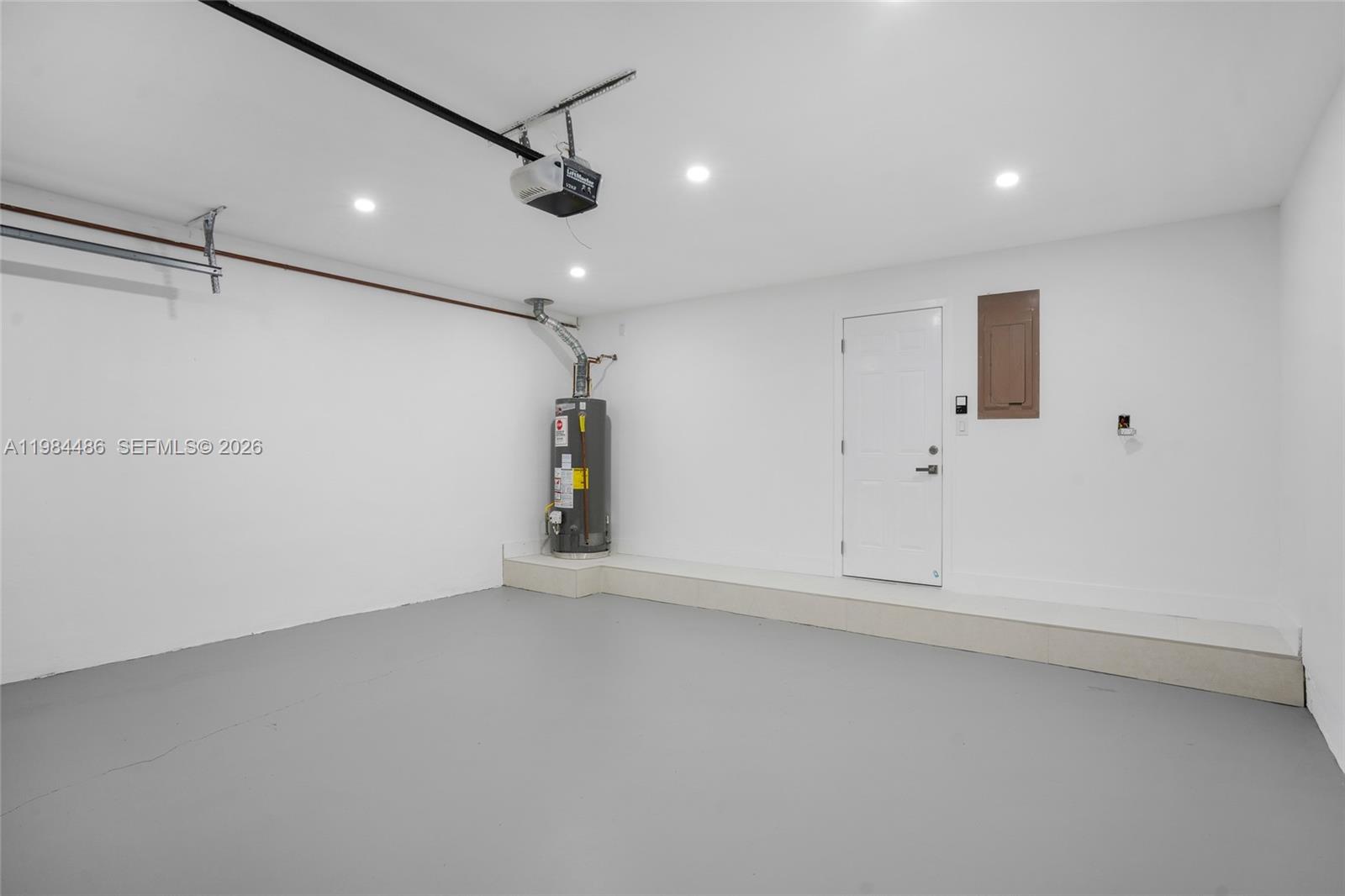 15174 Southwest 111th Street Miami, FL 33196 - Photo 35 of 49 an empty room with ceiling fan and wooden floor