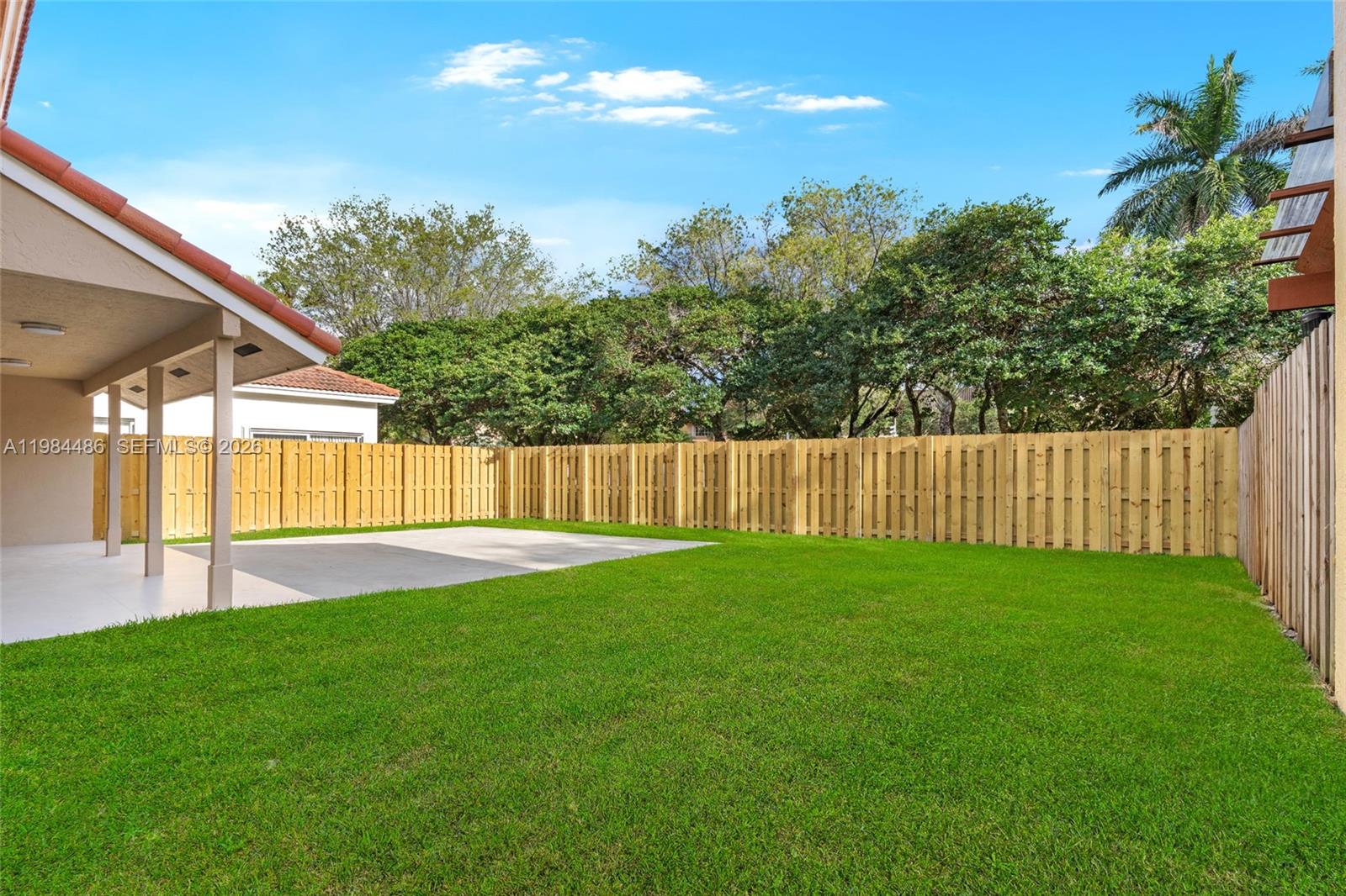 15174 Southwest 111th Street Miami, FL 33196 - Photo 38 of 49 a view of yard with green space
