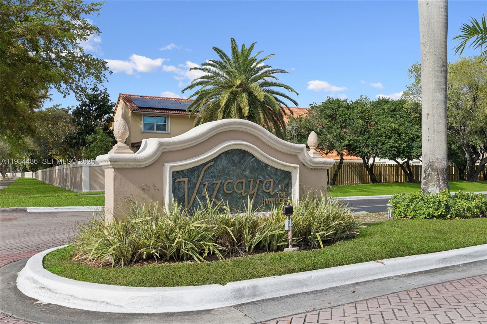 15174 Southwest 111th Street Miami, FL 33196 - Photo 42 of 49 a view of a house with a yard