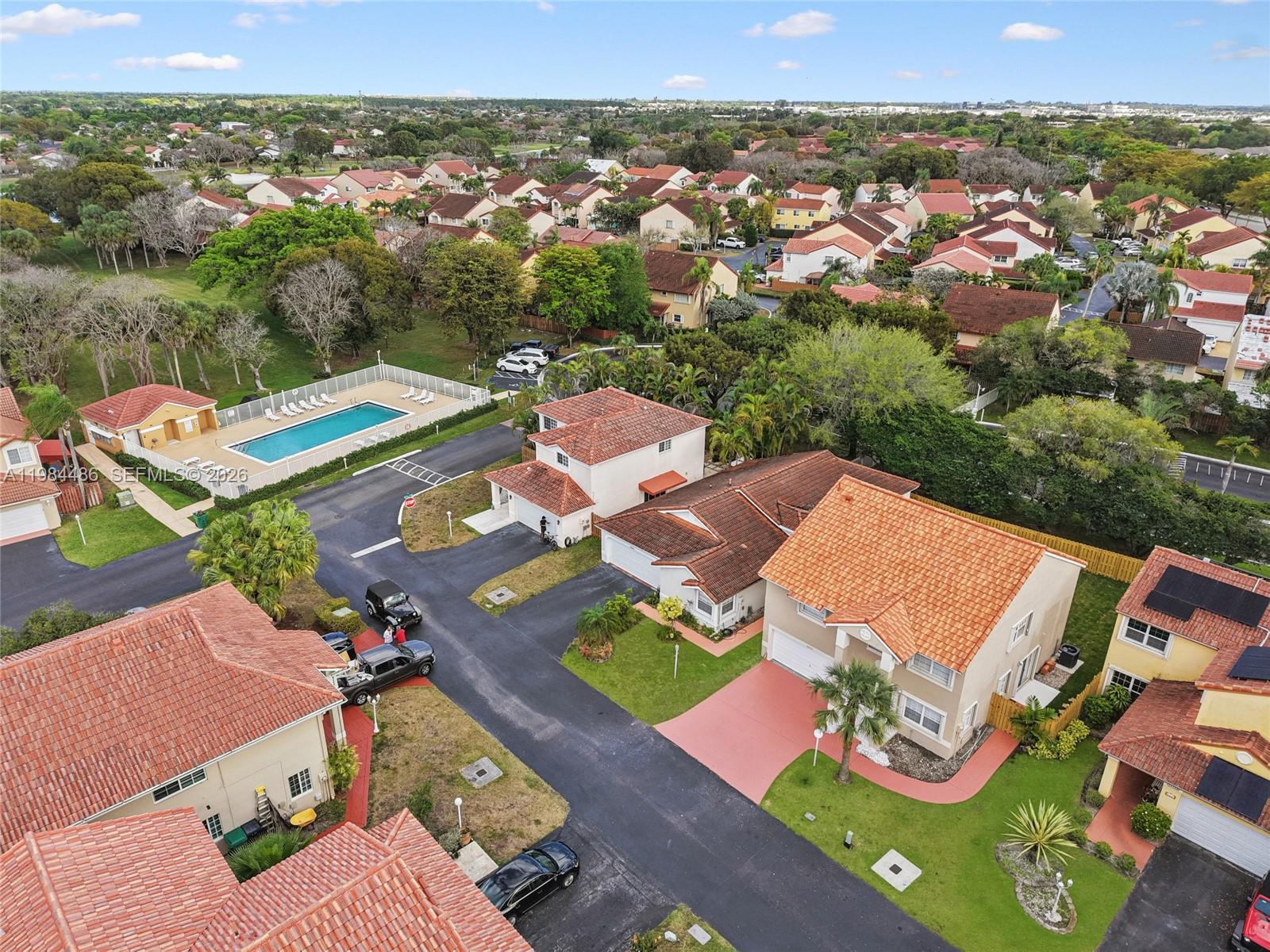 15174 Southwest 111th Street Miami, FL 33196 - Photo 45 of 49 an aerial view of a house with a outdoor space