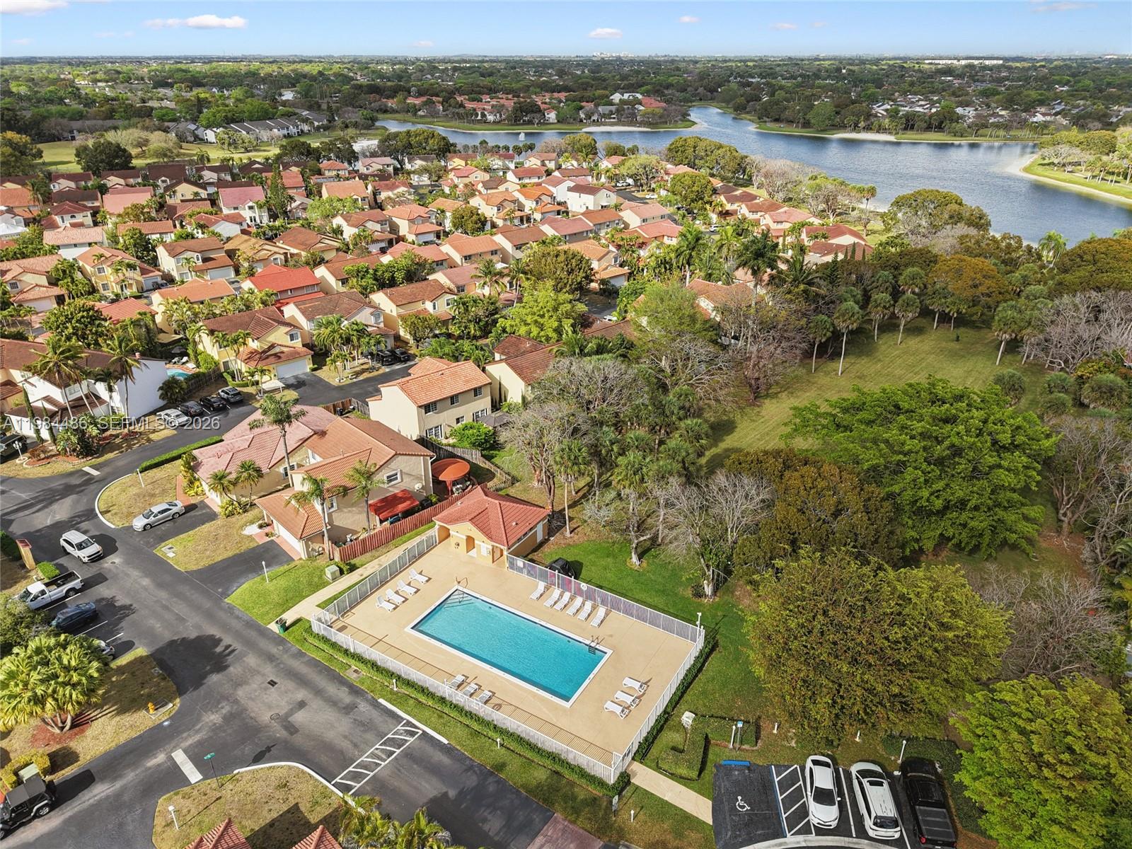 15174 Southwest 111th Street Miami, FL 33196 - Photo 49 of 49 an aerial view of residential houses with outdoor space and river