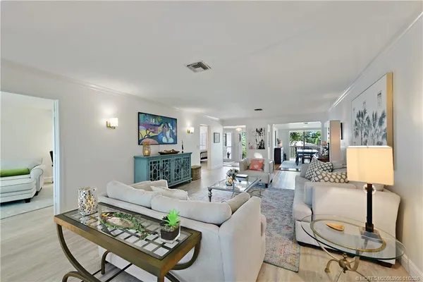 a living room with furniture and a table