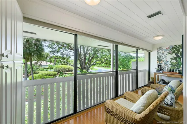 a kitchen with a sink appliances and cabinets
