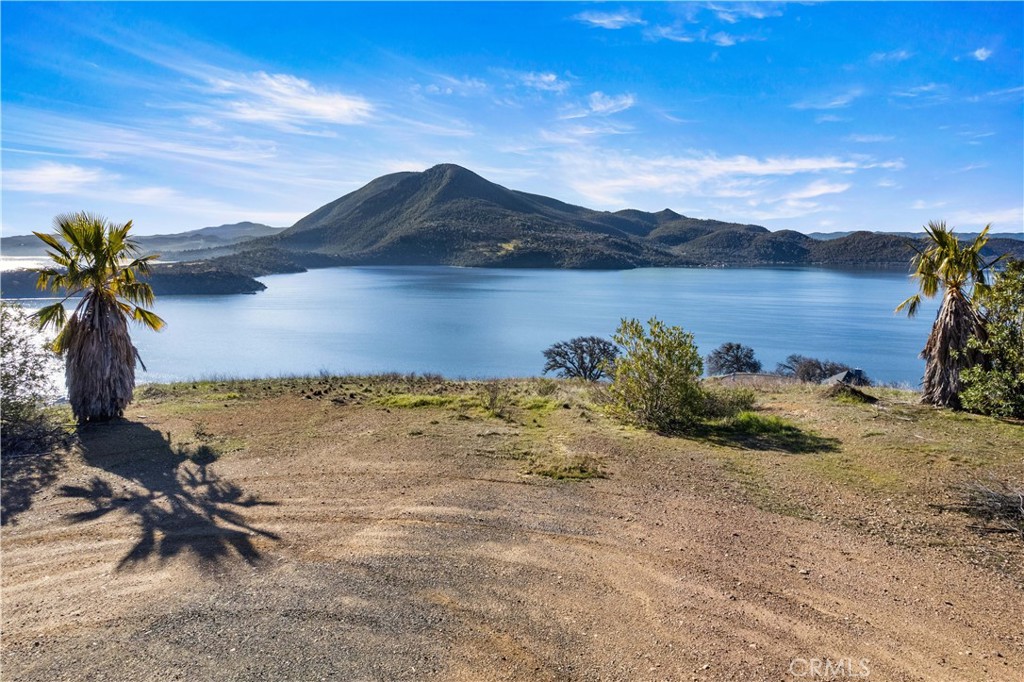7630 Verna Way Lucerne, CA 95458 - Photo 11 of 26 a view of a lake with a mountain in the background