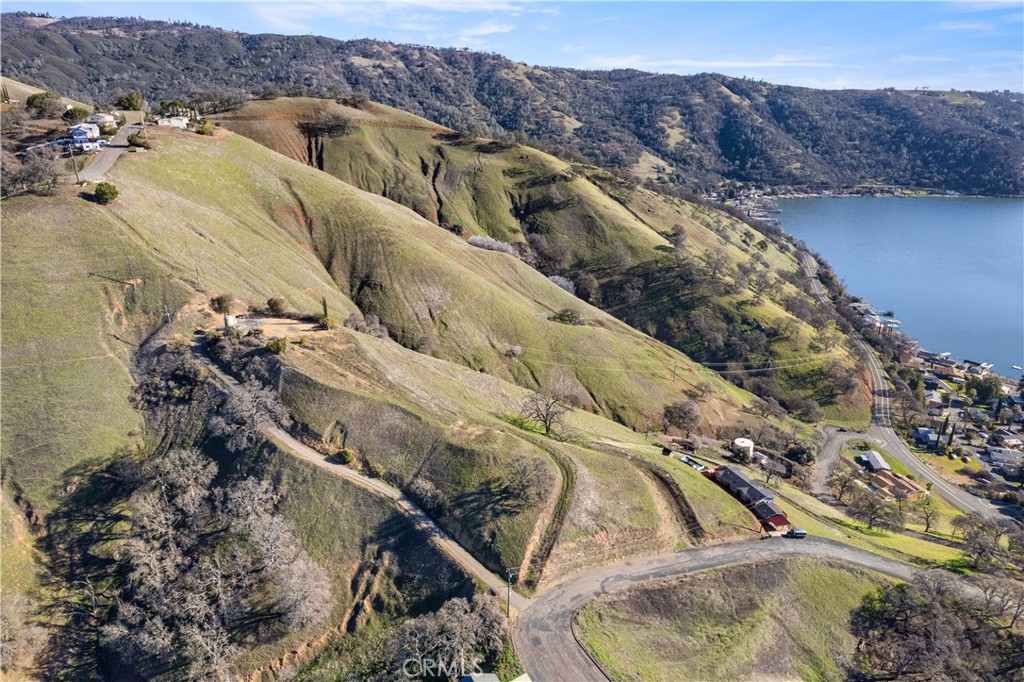 7630 Verna Way Lucerne, CA 95458 - Photo 12 of 26 a view of water heater and wooden floor