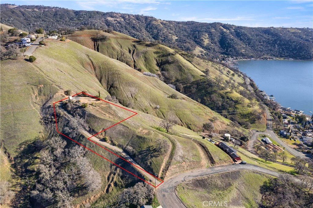 7630 Verna Way Lucerne, CA 95458 - Photo 15 of 26 a view of water heater and wooden floor