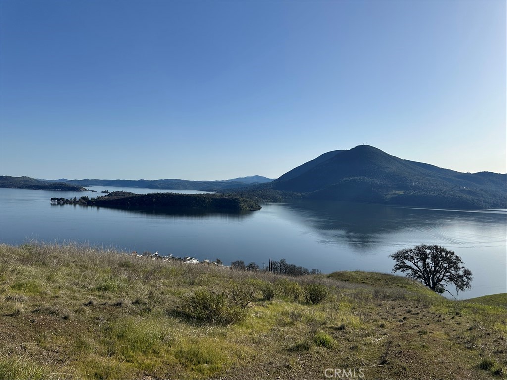 7630 Verna Way Lucerne, CA 95458 - Photo 23 of 26 a view of lake with mountain in the background