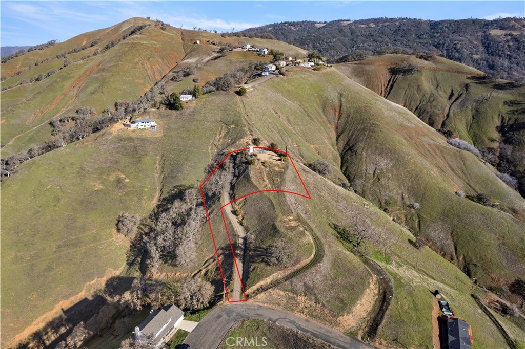 7630 Verna Way Lucerne, CA 95458 - Photo 6 of 26 an aerial view of a house with a mountain