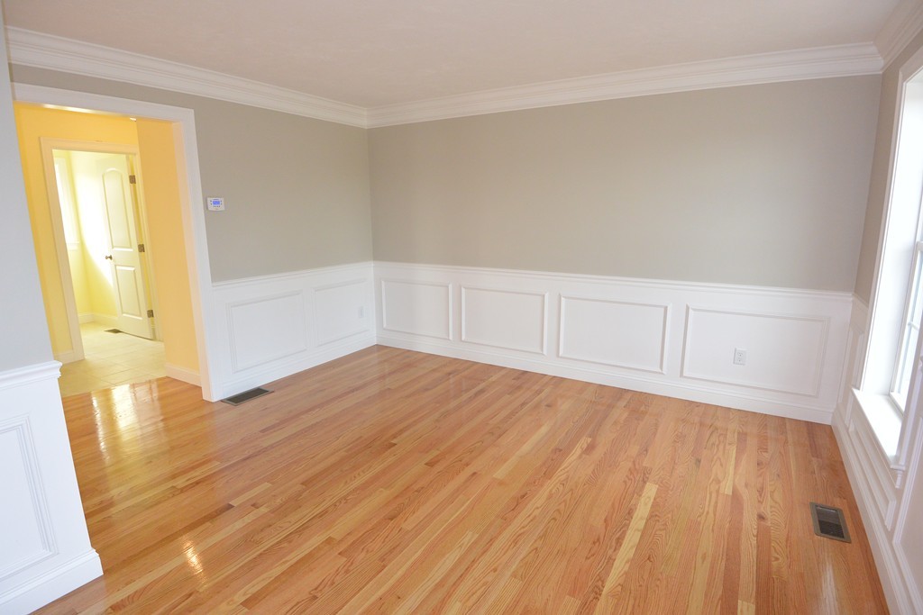 33 Runaway Brook Road Lancaster, MA 01523 - Photo 8 of 15 wooden floor in an empty room