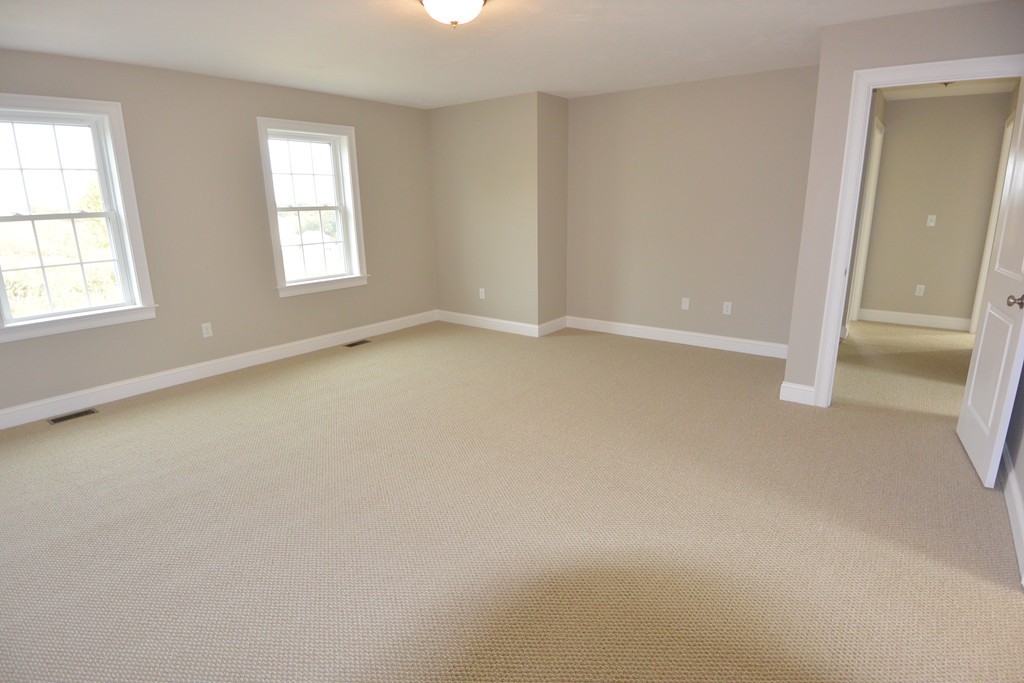 33 Runaway Brook Road Lancaster, MA 01523 - Photo 10 of 15 an empty room with windows
