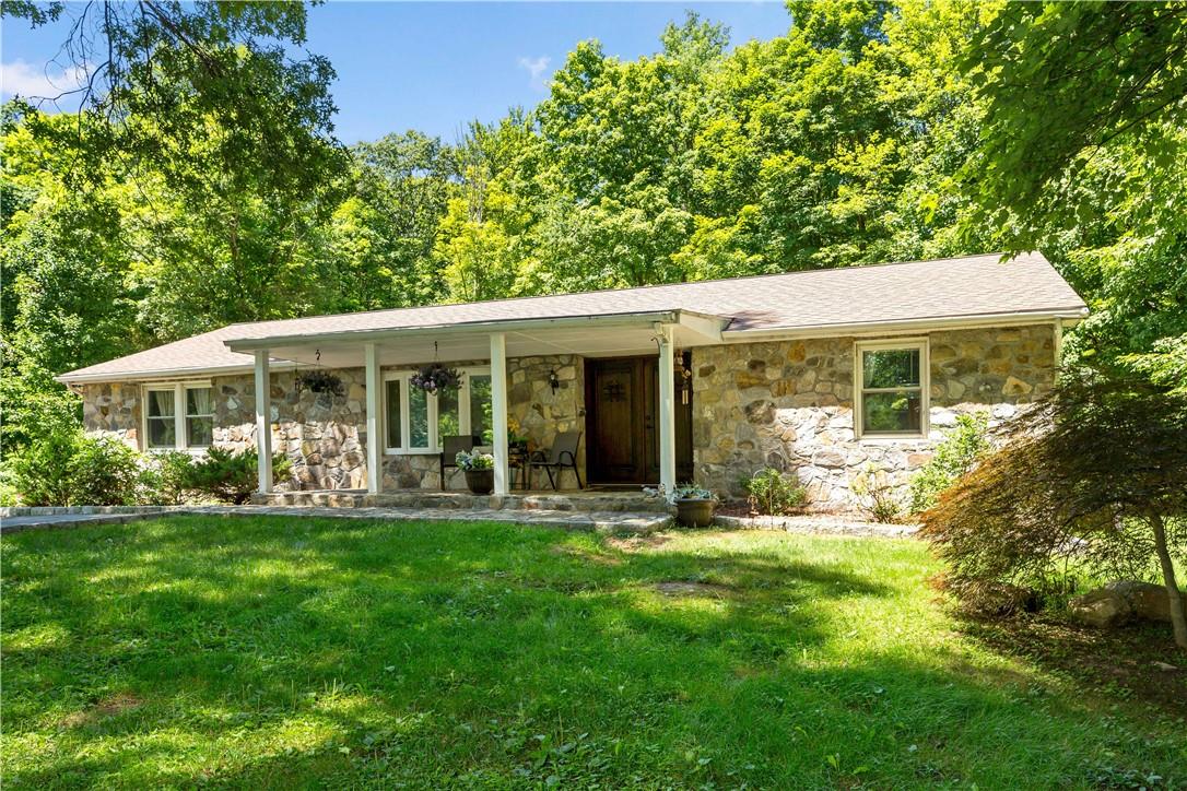 145 Hustis Road Cold Spring, NY 10516 - Photo 1 of 1 a front view of a house with a yard