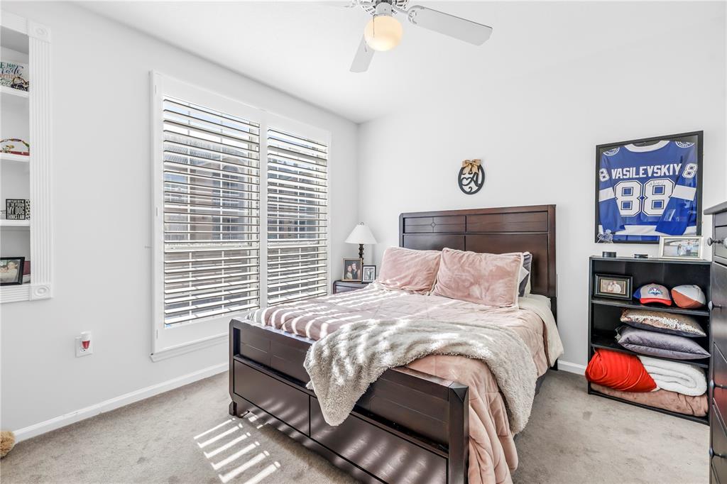 4206 Bay Club Circle, Unit 4206 Tampa, FL 33607 - Photo 17 of 60 a bedroom with a bed and a window