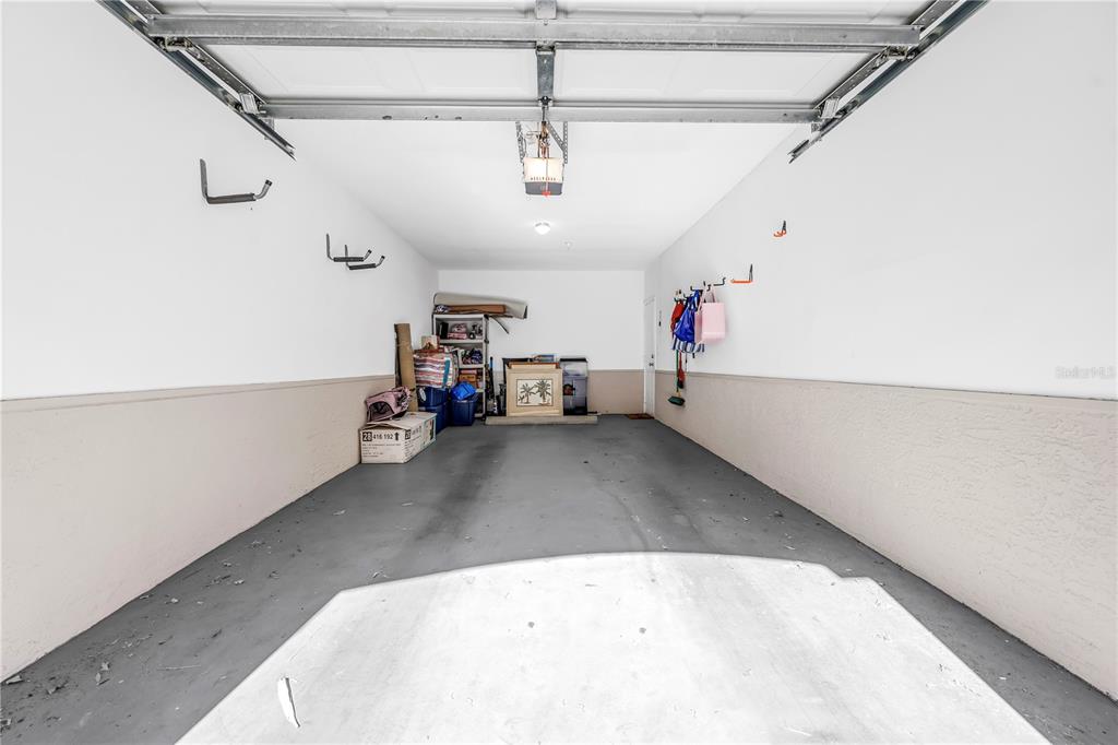 4206 Bay Club Circle, Unit 4206 Tampa, FL 33607 - Photo 28 of 60 a view of a room with wooden floor and staircase