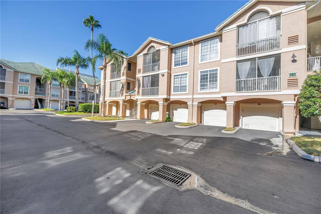 4206 Bay Club Circle, Unit 4206 Tampa, FL 33607 - Photo 30 of 60 a front view of a building with street view