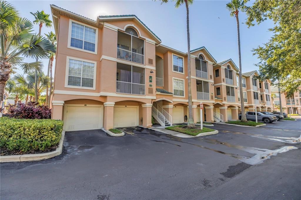 4206 Bay Club Circle, Unit 4206 Tampa, FL 33607 - Photo 32 of 60 a front view of a building with street