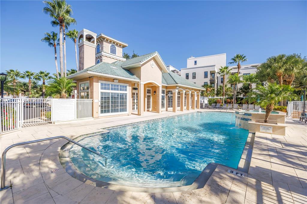 4206 Bay Club Circle, Unit 4206 Tampa, FL 33607 - Photo 38 of 60 a front view of a house with garden