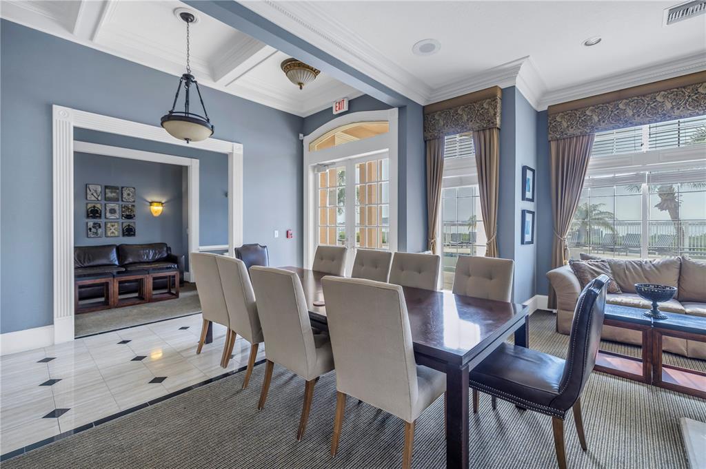 4206 Bay Club Circle, Unit 4206 Tampa, FL 33607 - Photo 53 of 60 a view of a dining room with furniture window and outside view