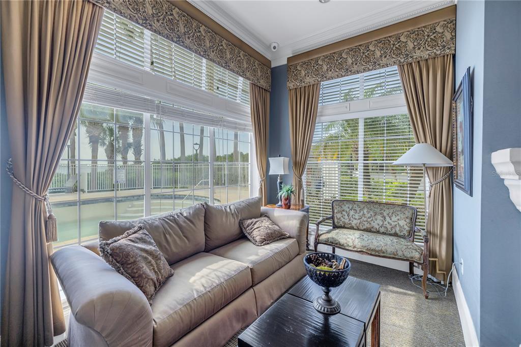 4206 Bay Club Circle, Unit 4206 Tampa, FL 33607 - Photo 56 of 60 a living room with furniture and a large window