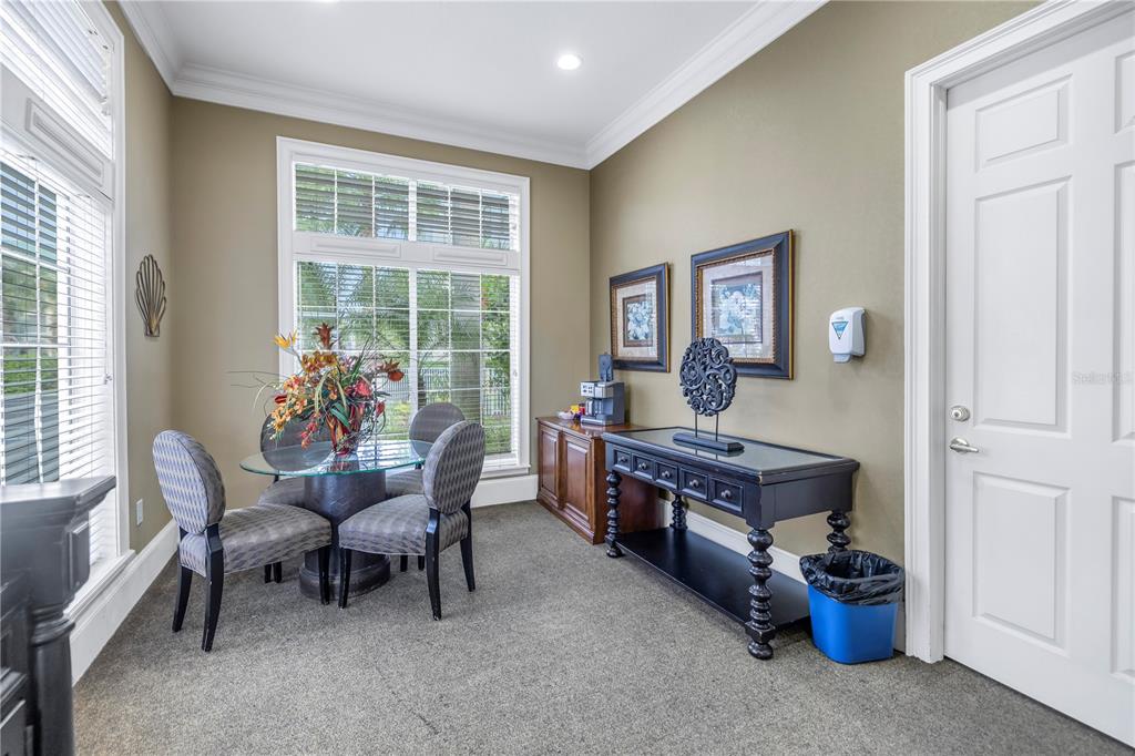 4206 Bay Club Circle, Unit 4206 Tampa, FL 33607 - Photo 58 of 60 a living room with furniture and a window