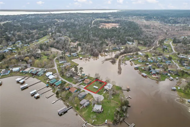 an aerial view of a houses with outdoor space