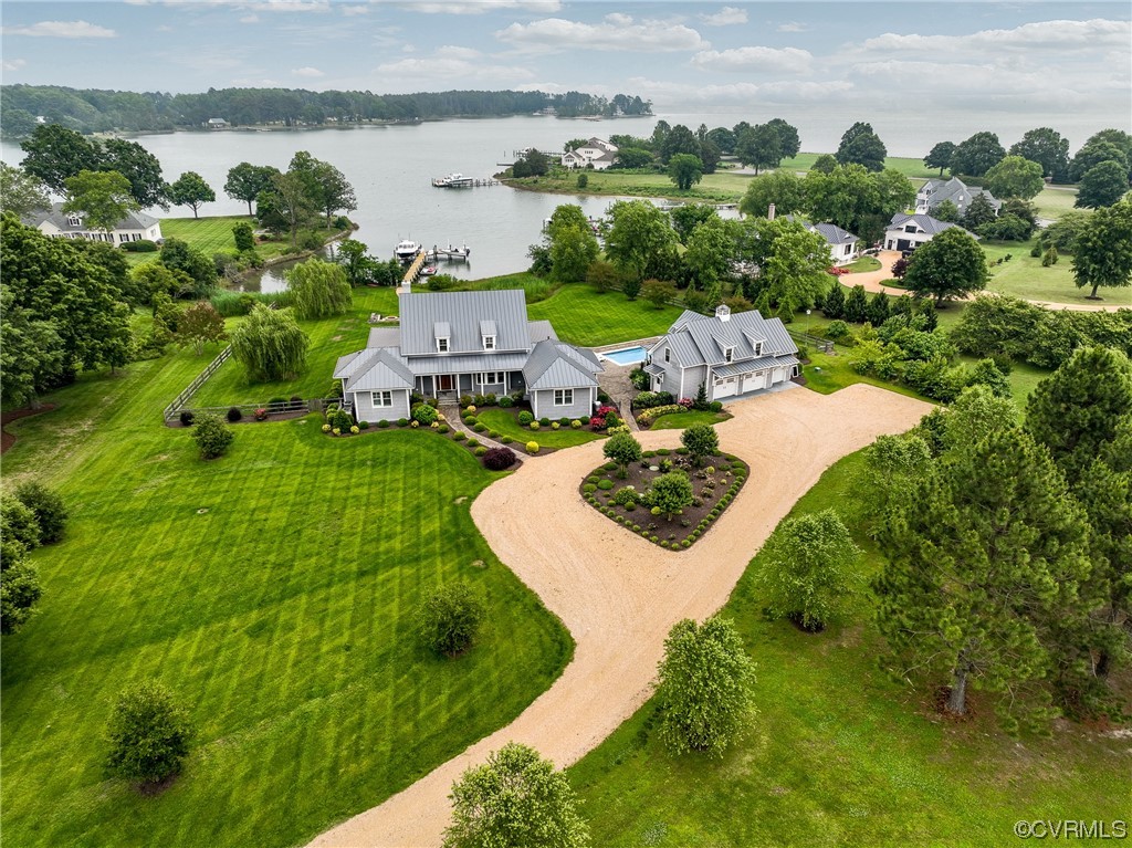 34 Crabshell Lane Kilmarnock, VA 22482 - Photo 1 of 50 an aerial view of residential houses with outdoor space and lake view