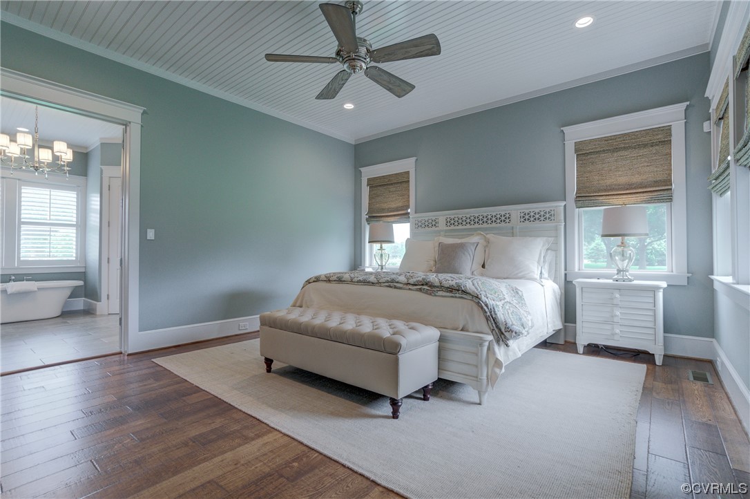 34 Crabshell Lane Kilmarnock, VA 22482 - Photo 17 of 50 a bed sitting in a spacious bedroom next to a window
