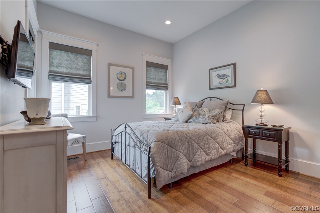 34 Crabshell Lane Kilmarnock, VA 22482 - Photo 22 of 50 a bedroom with a bed and a flat screen tv