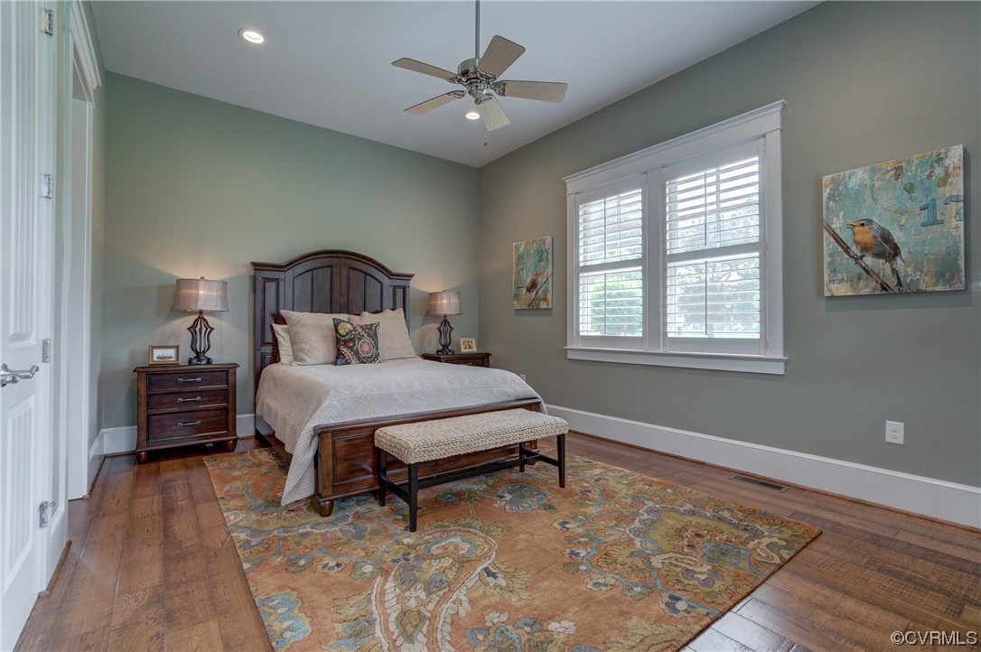 34 Crabshell Lane Kilmarnock, VA 22482 - Photo 23 of 50 a bedroom with a bed chandelier and a window