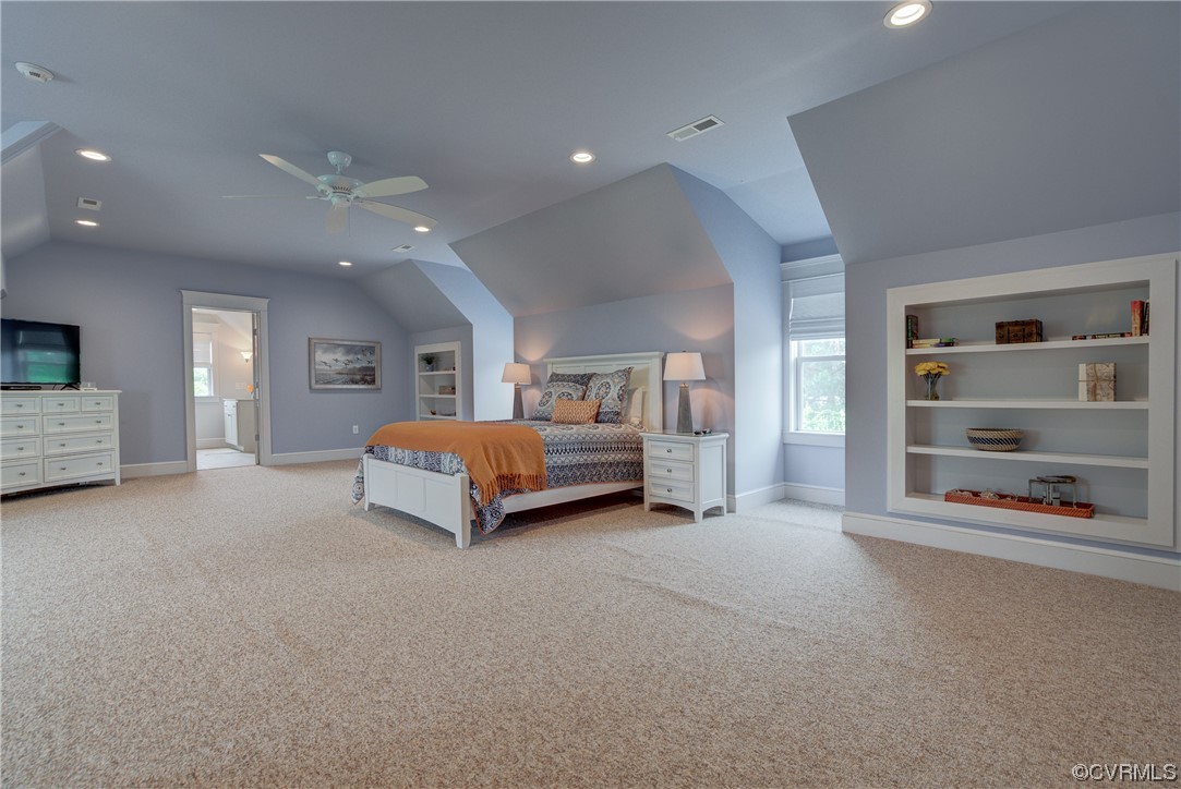 34 Crabshell Lane Kilmarnock, VA 22482 - Photo 32 of 50 a spacious bedroom with a bed and a large window