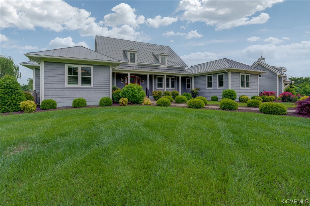 34 Crabshell Lane Kilmarnock, VA 22482 - Photo 4 of 50 a front view of a house with a yard