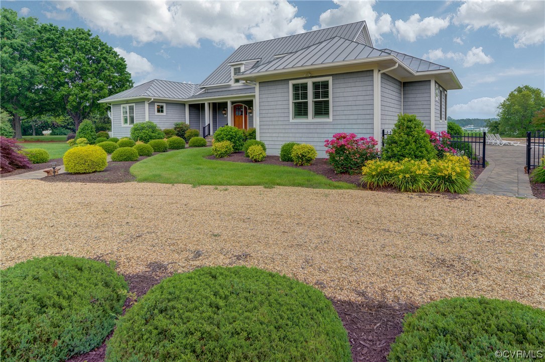 34 Crabshell Lane Kilmarnock, VA 22482 - Photo 6 of 50 a front view of house with yard and green space
