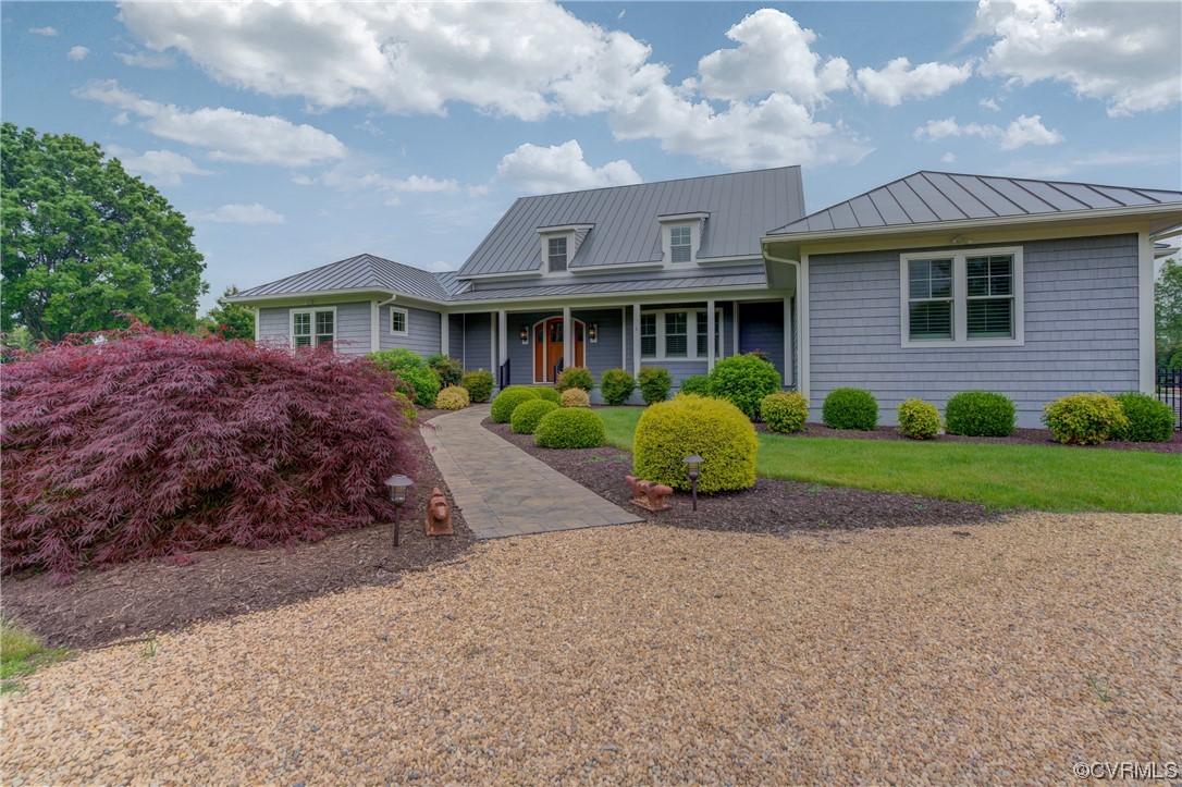 34 Crabshell Lane Kilmarnock, VA 22482 - Photo 7 of 50 a view of a big house with a big yard and potted plants