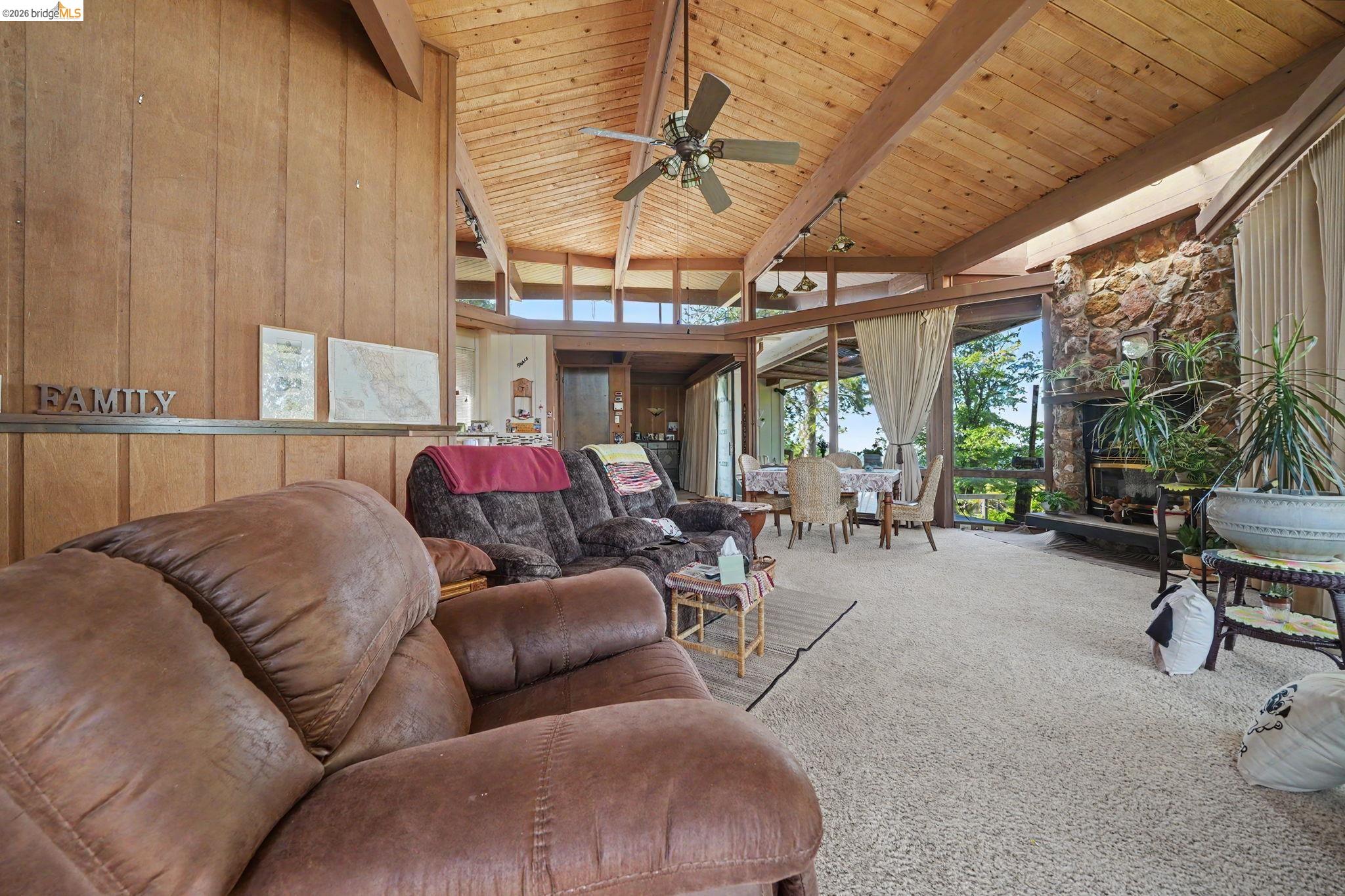 6161 Fullen Road Murphys, CA 95247 - Photo 38 of 53 a living room with furniture and a chandelier