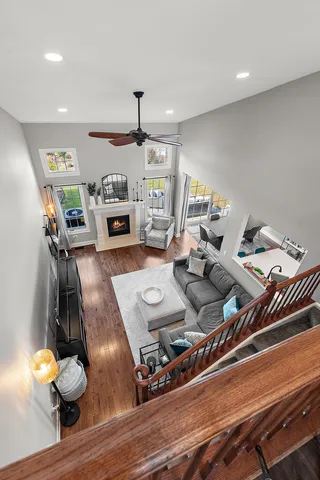 a living room with furniture and flat screen tv