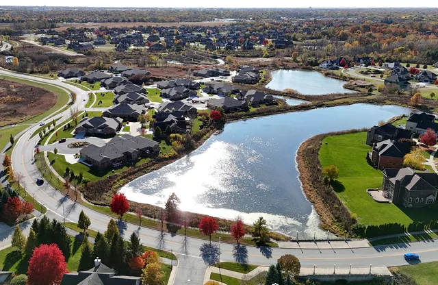 an aerial view of a city with lots of residential buildings