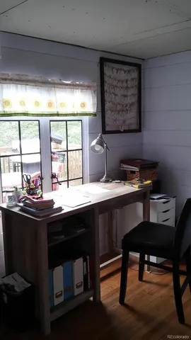 a kitchen with a sink appliances and a window