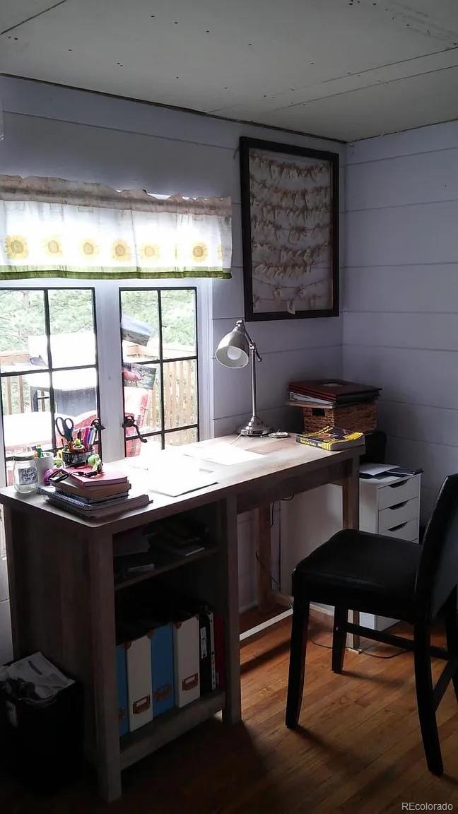 26079 Kingsbury Road Kittredge, CO 80457 - Photo 12 of 28 a kitchen with a sink appliances and a window