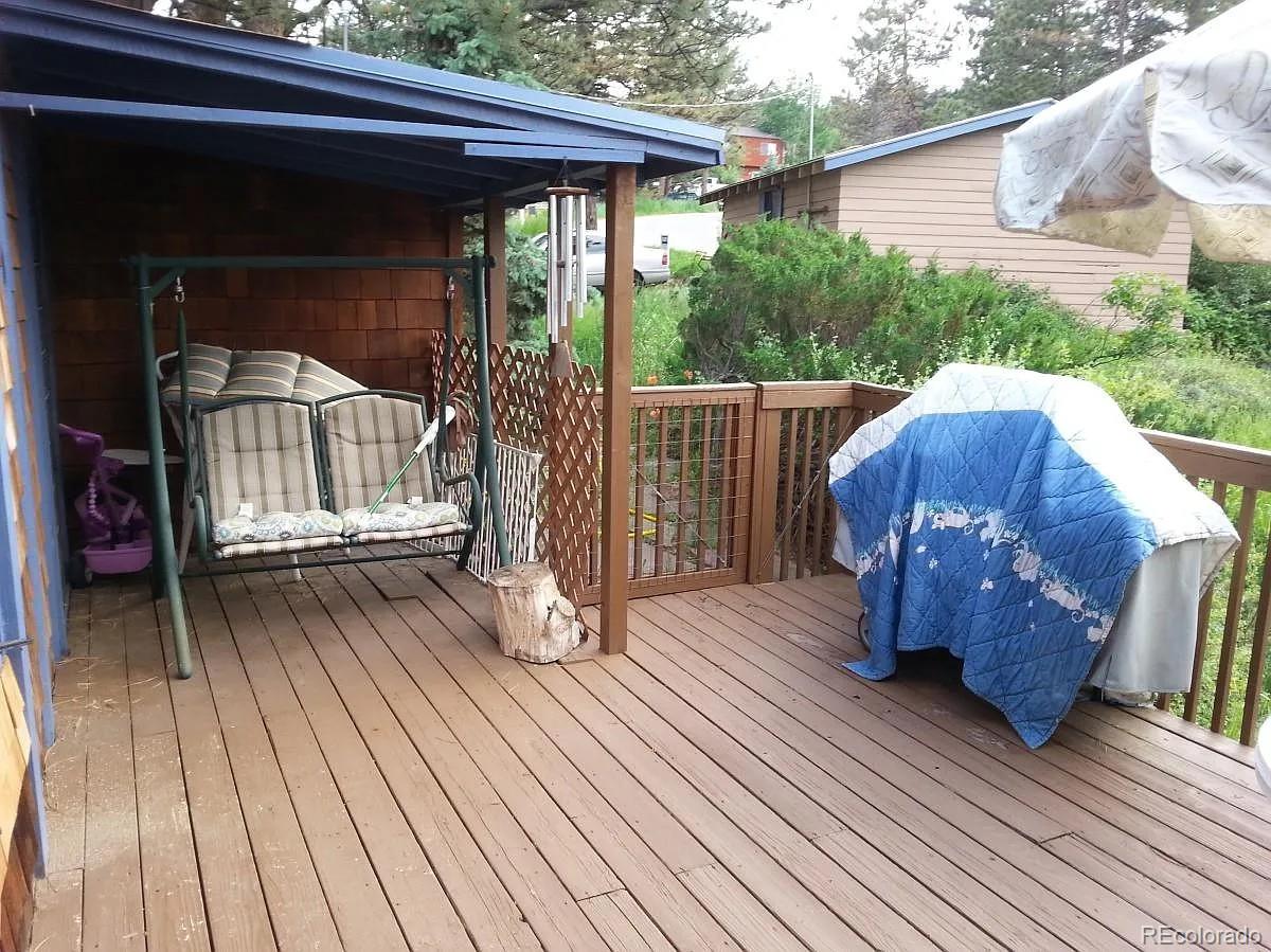 26079 Kingsbury Road Kittredge, CO 80457 - Photo 27 of 28 a view of deck with patio