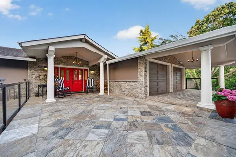 a view of outdoor space yard and front view of a house