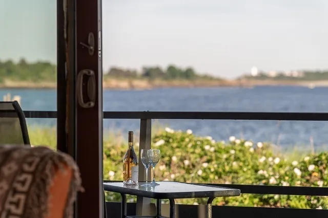 a view of swimming pool from a balcony