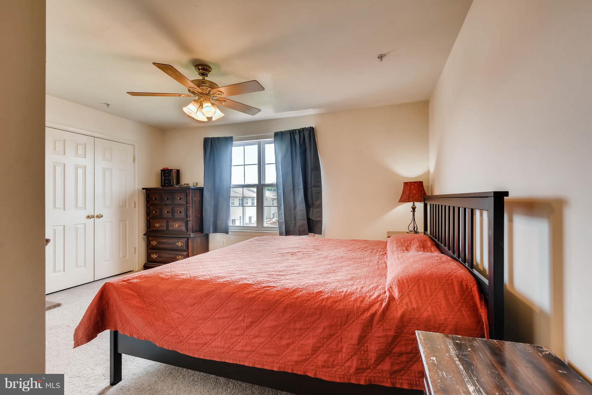 4019 Cutty Sark Road Baltimore, MD 21220 - Photo 23 of 30 a bed sitting in a bedroom and a large window