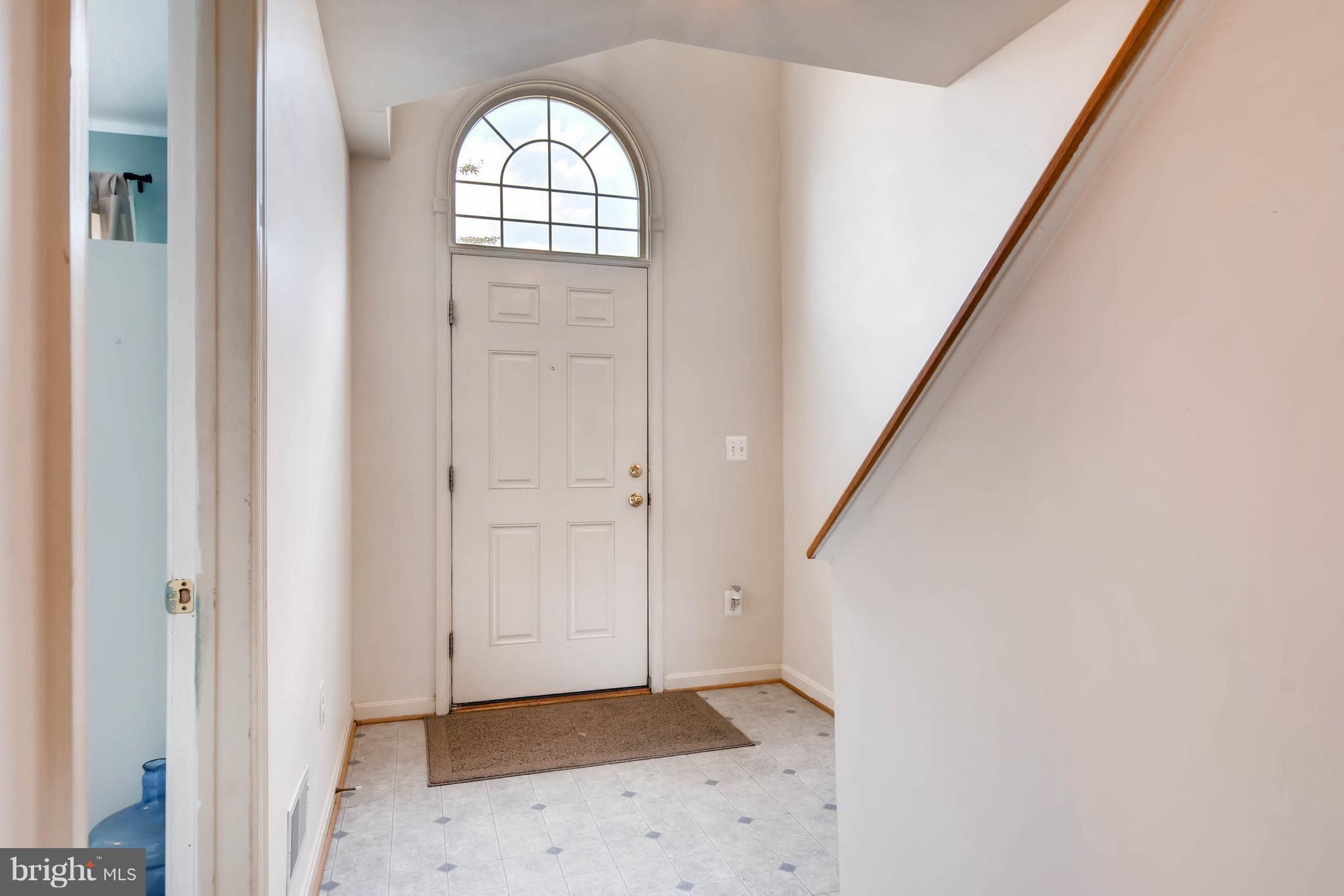 4019 Cutty Sark Road Baltimore, MD 21220 - Photo 4 of 30 a view of an entryway with wooden floor