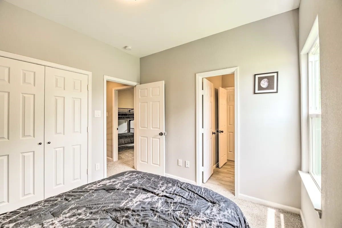 4909 Sunflower Street Houston, TX 77033 - Photo 14 of 25 a bedroom with a bed and a window
