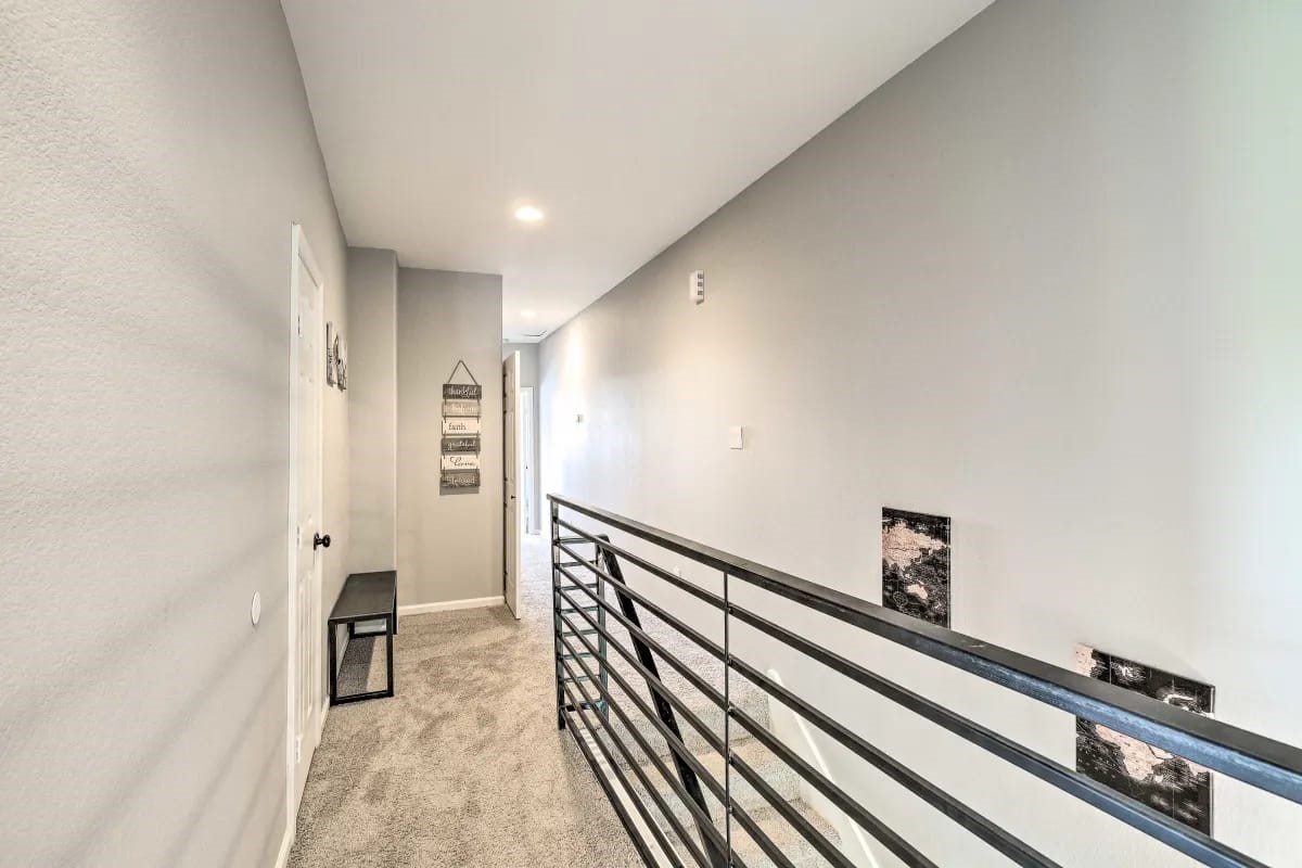 4909 Sunflower Street Houston, TX 77033 - Photo 20 of 25 a view of a hallway with staircase