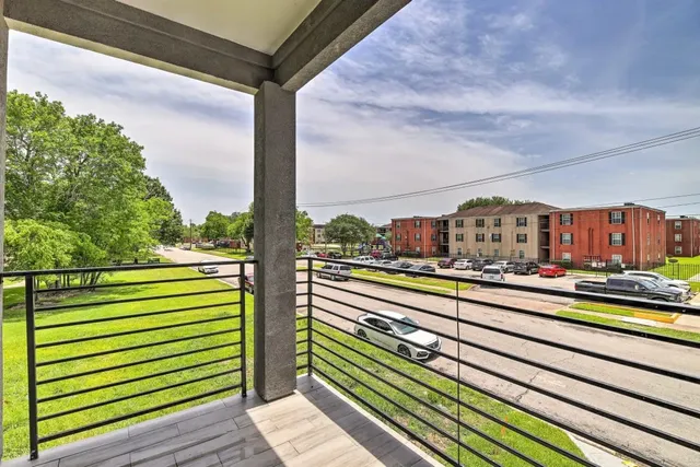 a view of a balcony with city view