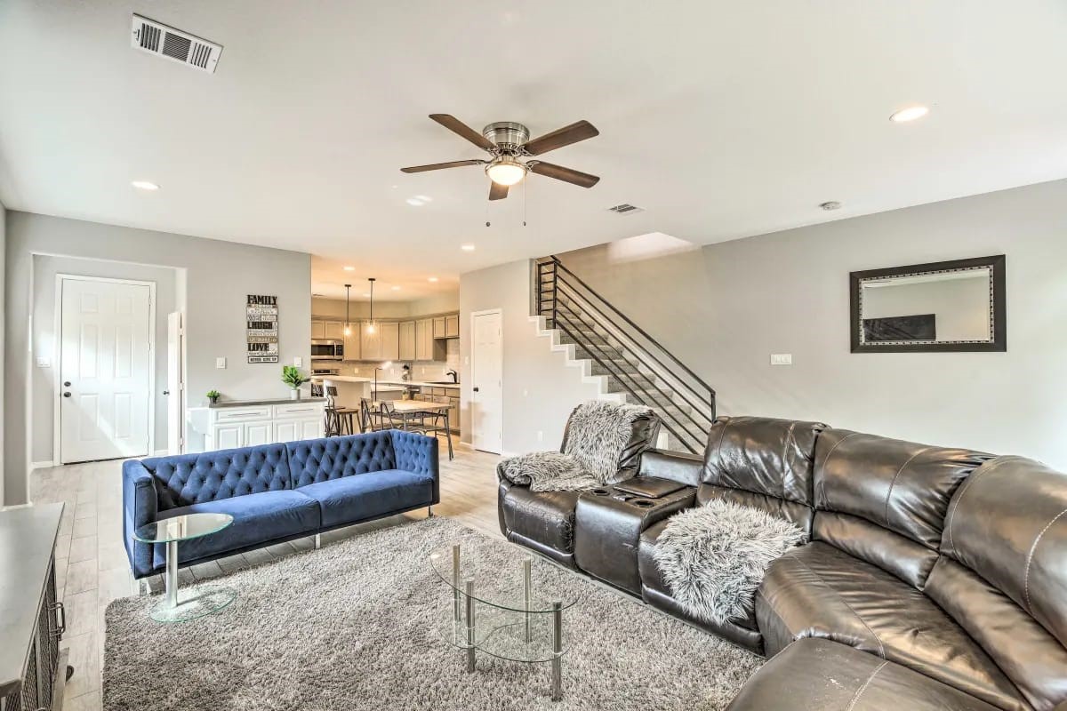4909 Sunflower Street Houston, TX 77033 - Photo 7 of 25 a living room with a couch and ceiling fan