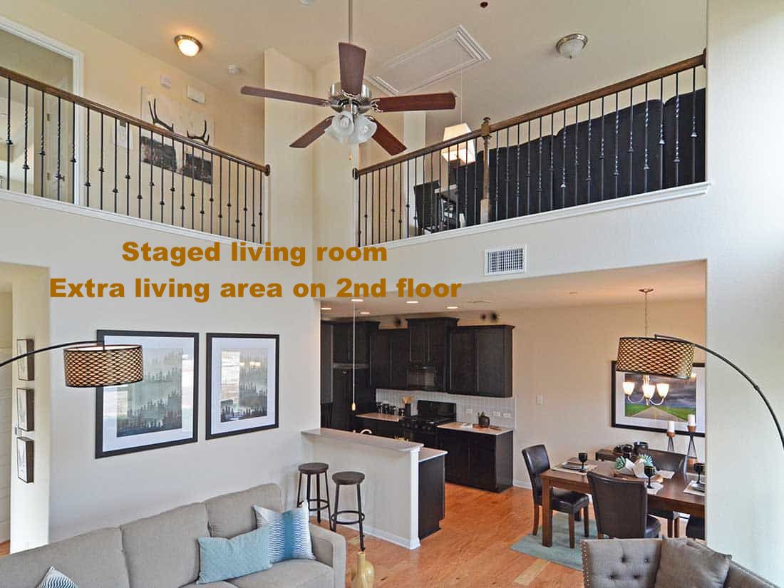1612 Airedale Road Austin, TX 78748 - Photo 3 of 21 Living room with ceiling fan, light wood finished floors, and a high ceiling