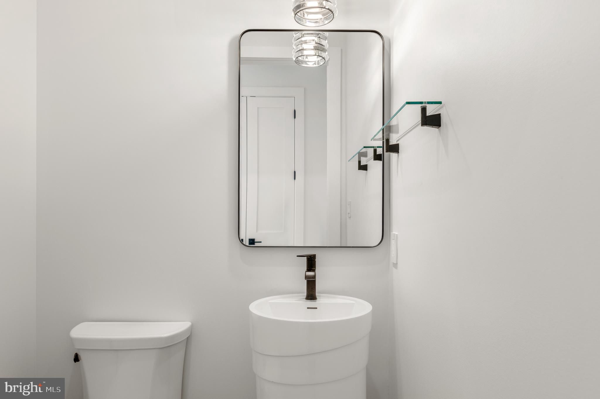6916 Marbury Road Bethesda, MD 20817 - Photo 12 of 89 Main Floor Modern Powder Room