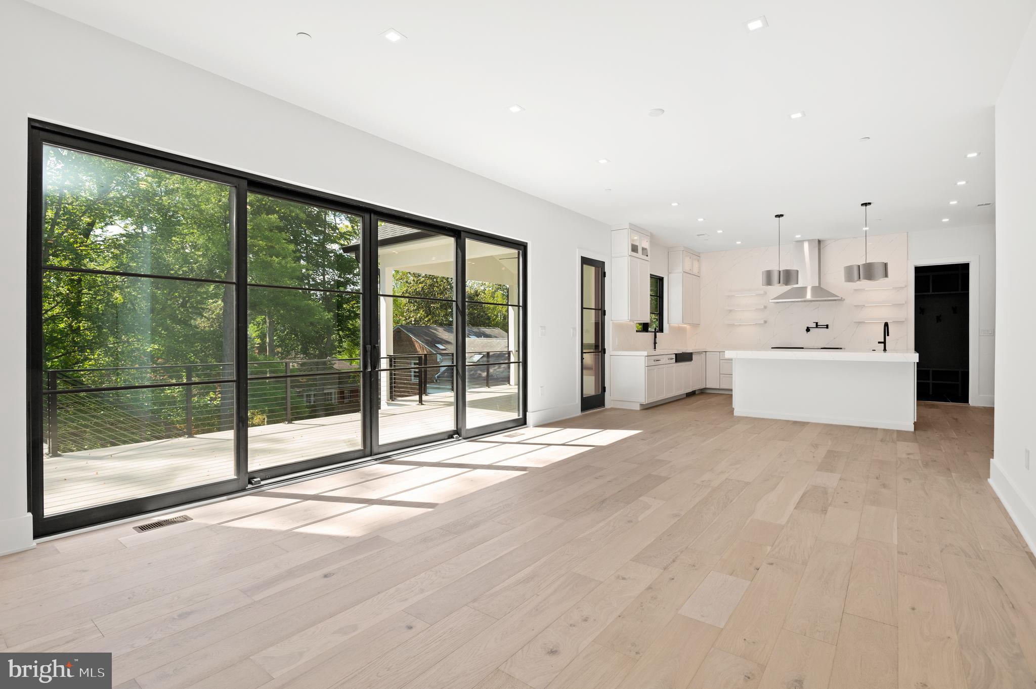 6916 Marbury Road Bethesda, MD 20817 - Photo 28 of 89 Walls of Doors open to Deck and Terrace